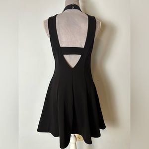 Free people high neck halter open back cocktail dress with pockets. size M